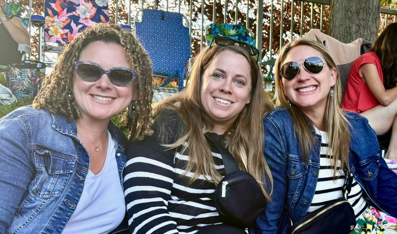 Photo of three smiling women