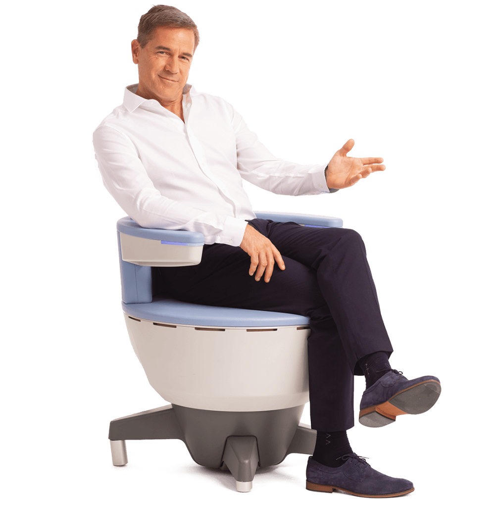 Photo of a man sitting in the EMSELLA<sup>®</sup> chair